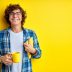 Happy,Student,Guy,Is,Ready,To,Study,,Stand,With,Cup